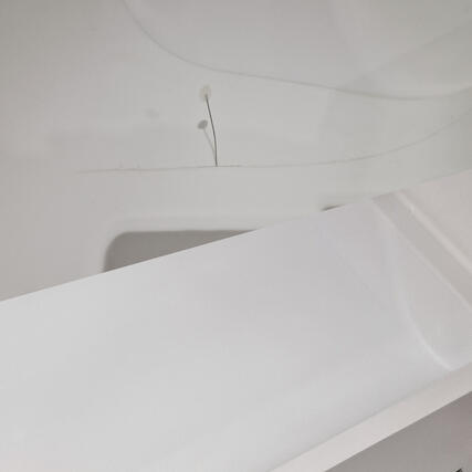 Shower tray crack repaired in a hotel in Cardiff