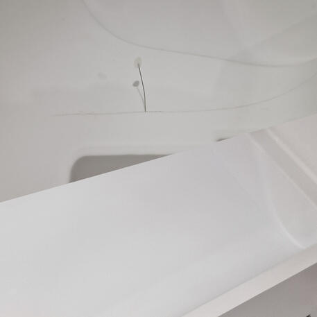 Shower tray crack repaired in a hotel in Cardiff